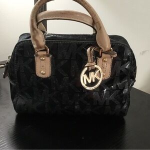 (122) Michael Kors Black Mini Satchel with Tan Handles and Gold Logo Charm